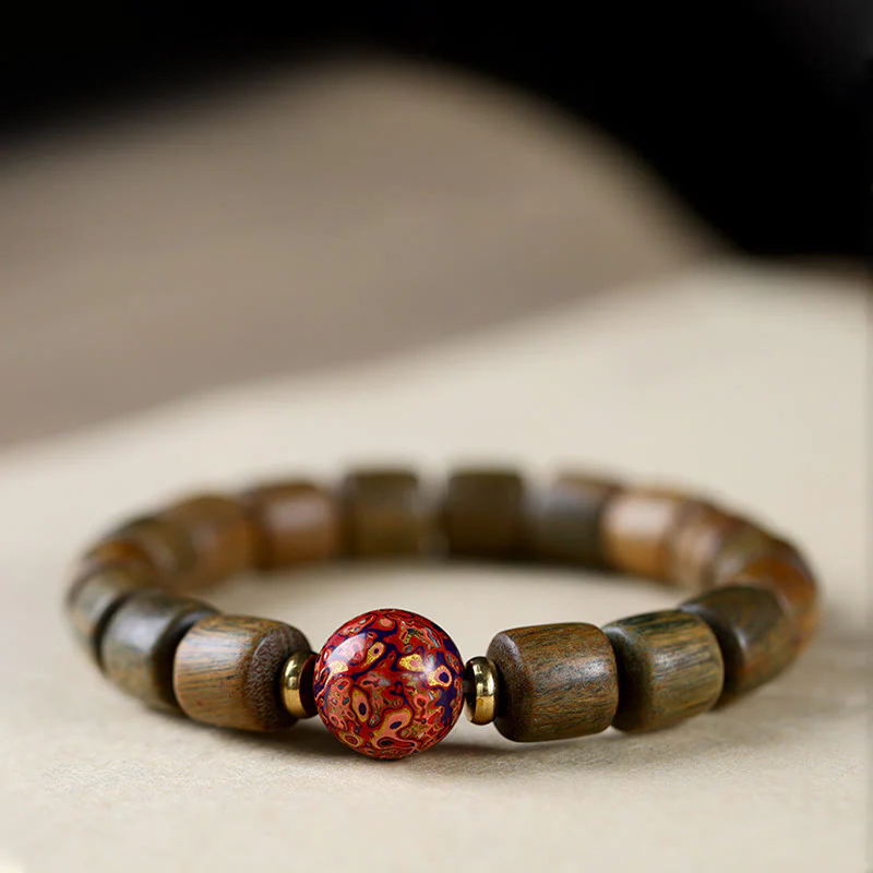 Braccialetto della pace con perline di lacca di sandalo rosso e piccole foglie di sandalo verde naturale Buddha Stones - Image 4