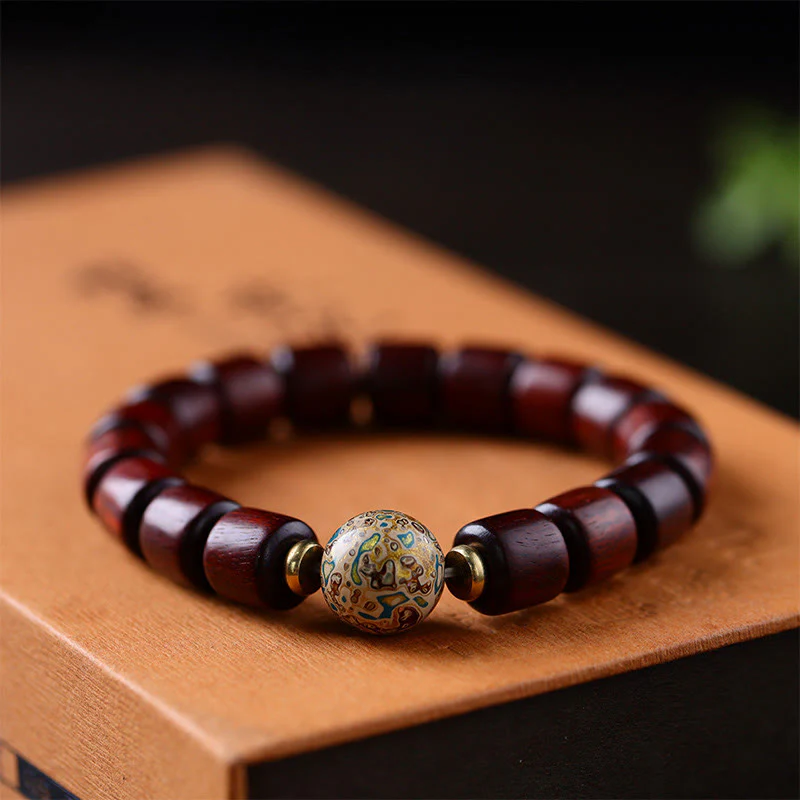 Braccialetto della pace con perline di lacca di sandalo rosso e piccole foglie di sandalo verde naturale Buddha Stones - Image 9