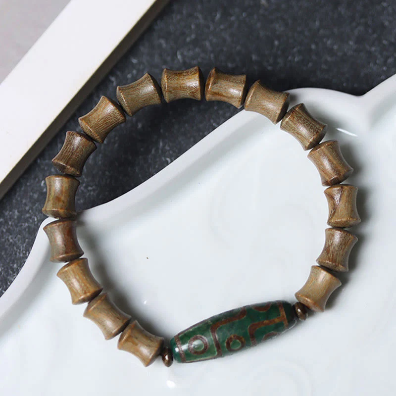 Braccialetto della pace in legno di sandalo verde con perline Dzi tibetane a nove occhi Buddha Stones - Image 2