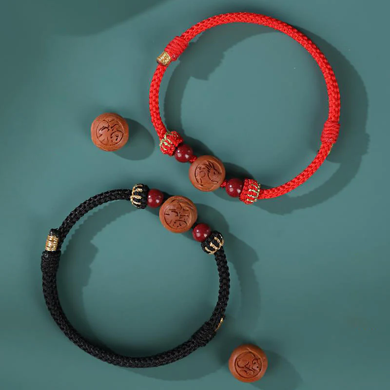 Braccialetto della ricchezza in cinabro intagliato con carattere dello zodiaco cinese Fu in legno di pesca naturale Buddha Stones - Image 17