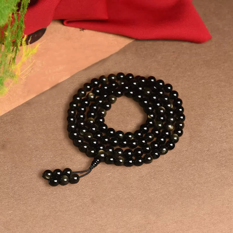 Braccialetto della ricchezza in ossidiana naturale con 108 perle di Mala Buddha Stones - Image 10