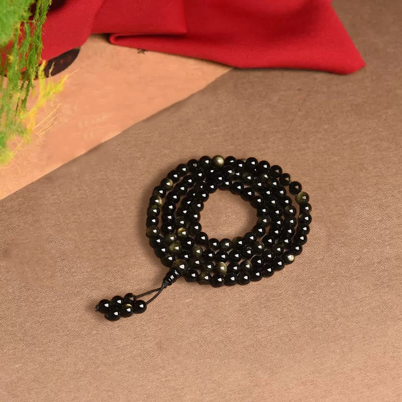 Braccialetto della ricchezza in ossidiana naturale con 108 perle di Mala Buddha Stones - Image 9