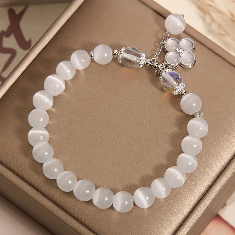Braccialetto dell'amore con ciondolo a forma di quadrifoglio fortunato con cristalli occhio di gatto Buddha Stones - Image 3