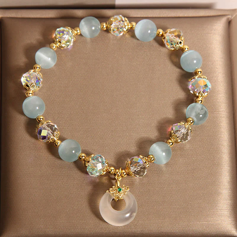 Braccialetto dell'equilibrio con fibbia della pace in cristallo bianco e Buddha Stones blu occhio di gatto - Image 5