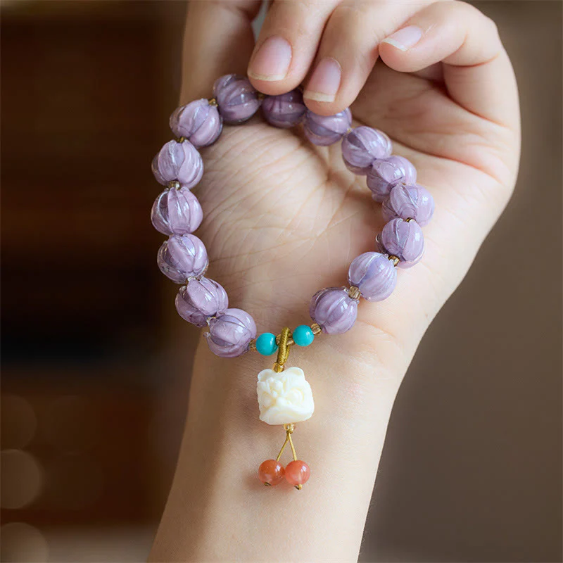 Braccialetto dell'illuminazione con ciondolo leone danzante avorio, perline di vetro Liuli, motivo loto, fluorite e Buddha Stones - Image 6