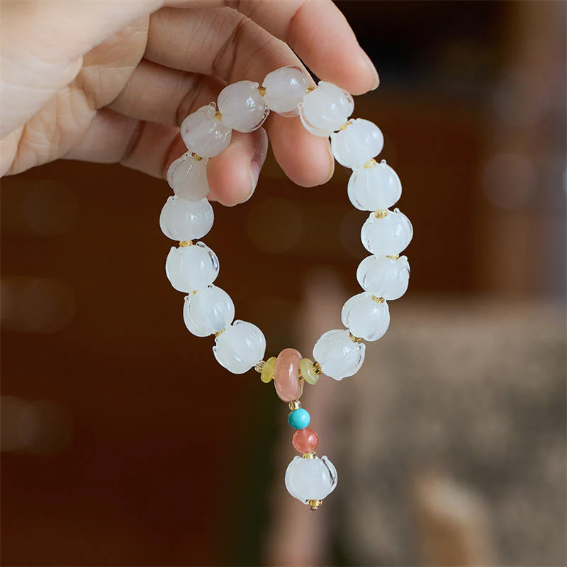 Braccialetto dell'illuminazione con ciondolo leone danzante avorio, perline di vetro Liuli, motivo loto, fluorite e Buddha Stones - Image 7