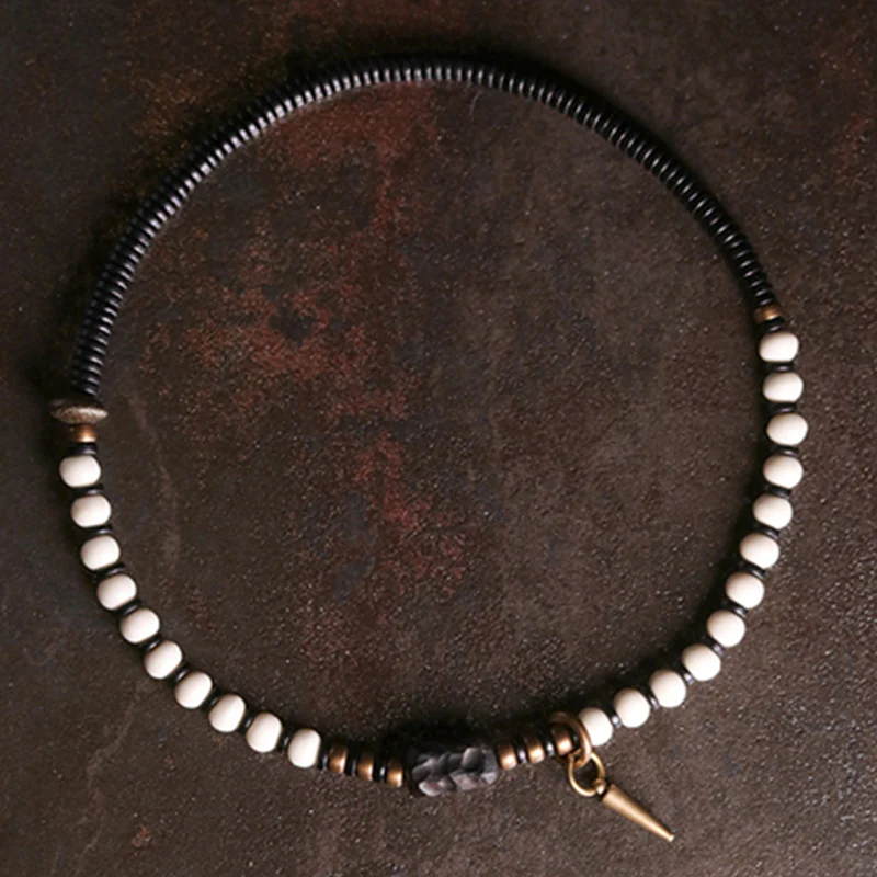 Braccialetto di coppia con perline di osso, ebano, Buddha Stones e rame - Image 6