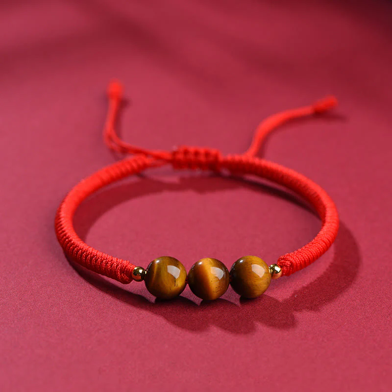 Braccialetto di corda di protezione della fortuna con perline di occhio di tigre fatto a mano Buddha Stones - Image 11