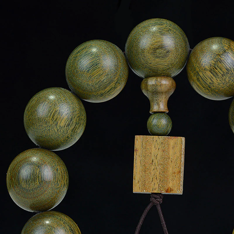 Braccialetto di cura in legno di sandalo verde tibetano Buddha Stones - Image 7