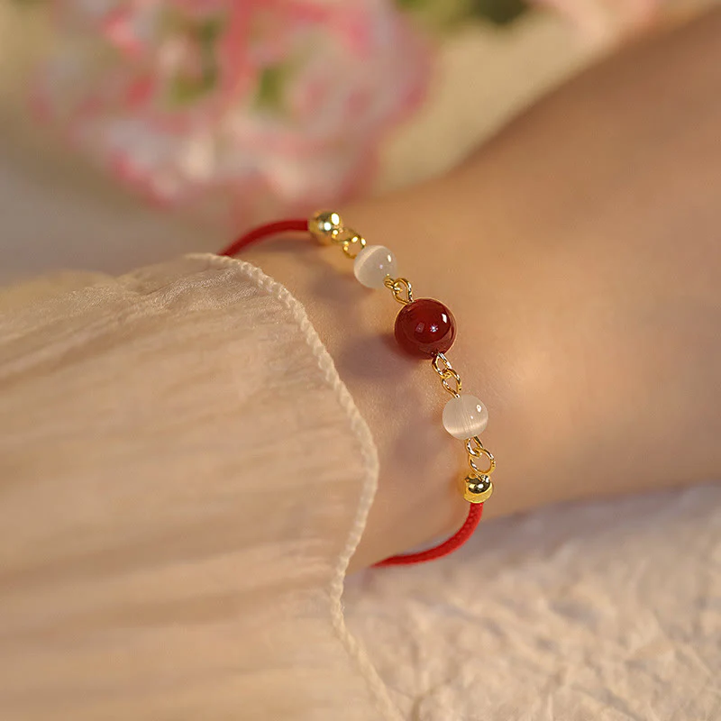 Braccialetto di fiducia in corda intrecciata con occhio di gatto e agata rossa Buddha Stones