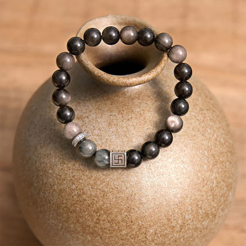 Braccialetto di forza e coraggio in ossidiana nera con occhio d'aquila di Buddha Stones - Image 4