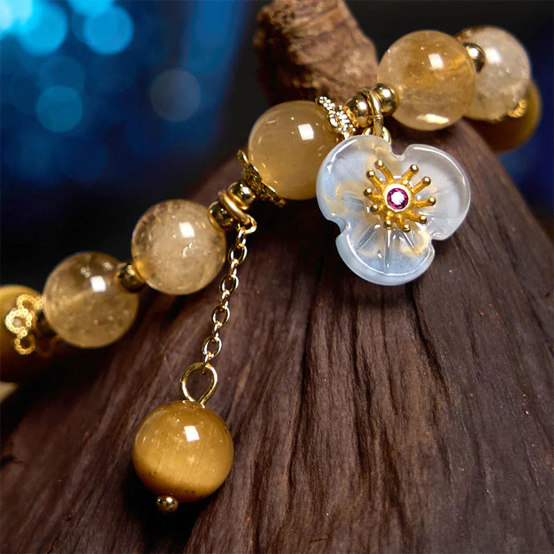 Braccialetto di generosità con ciondolo a forma di fiore con occhio di tigre e citrino Buddha Stones - Image 3