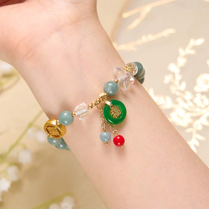 Braccialetto di guarigione con ciondolo a forma di carattere Fu in quarzo fragola e giada Buddha Stones - Image 11