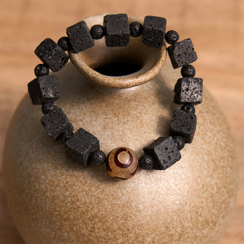 Braccialetto di guarigione con perline di Dzi e pietra lavica Buddha Stones - Image 3
