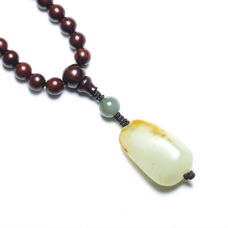 Braccialetto di meditazione Mala in giada di sandalo rosso con piccole foglie tibetane di Buddha Stones - Image 3