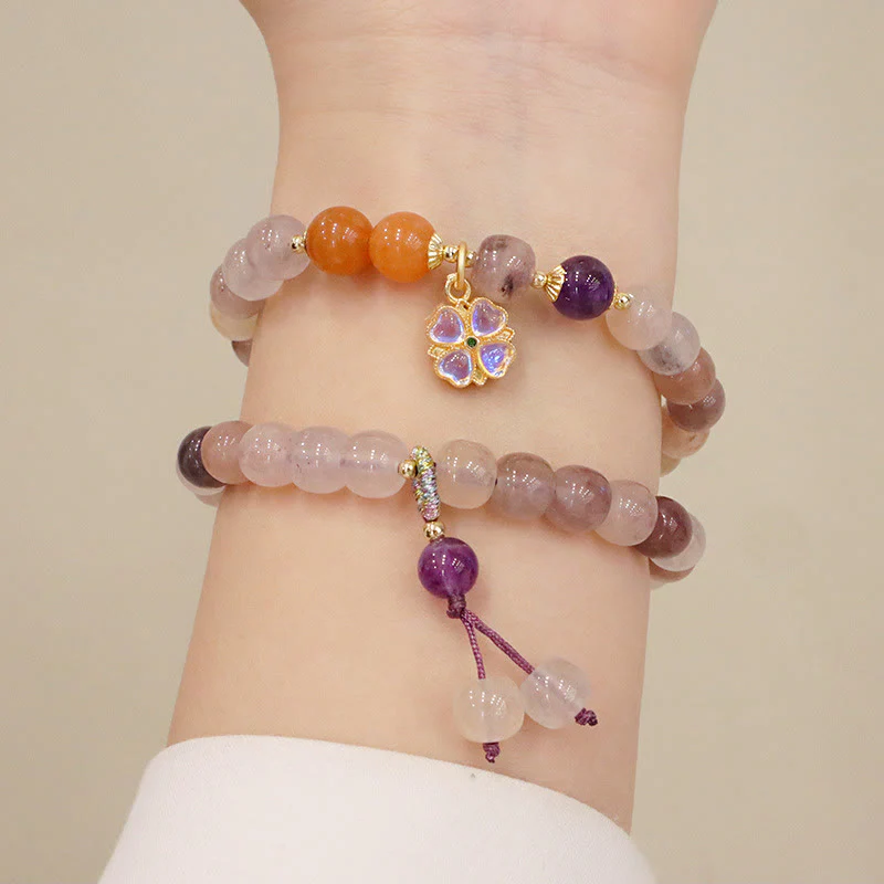 Braccialetto di perline con ciondolo a forma di fiore viola dorato naturale di seta Buddha Stones - Image 12