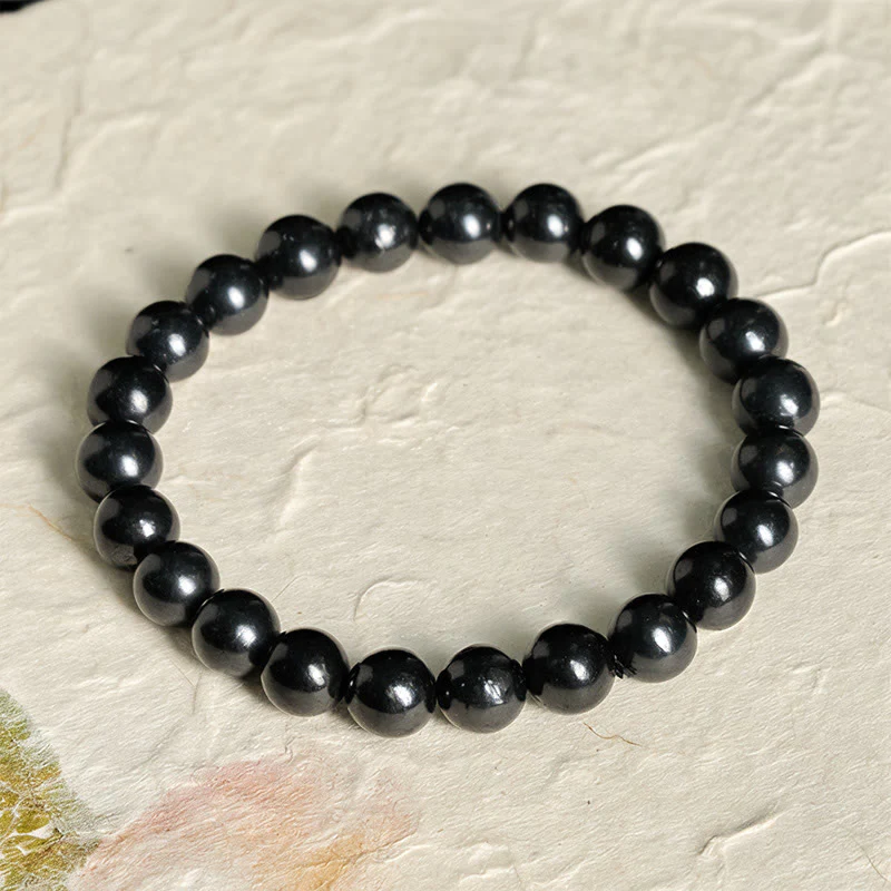 Braccialetto di perline con forza interiore in pietra di shungite autentica e rotonda Buddha Stones - Image 8