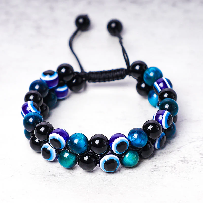 Braccialetto di perline di protezione dell'occhio di tigre con ematite e Buddha Stones