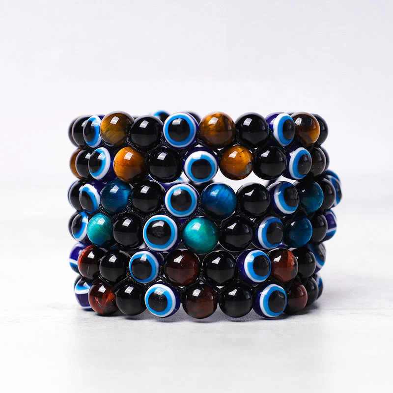 Braccialetto di perline di protezione dell'occhio di tigre con ematite e Buddha Stones - Image 4