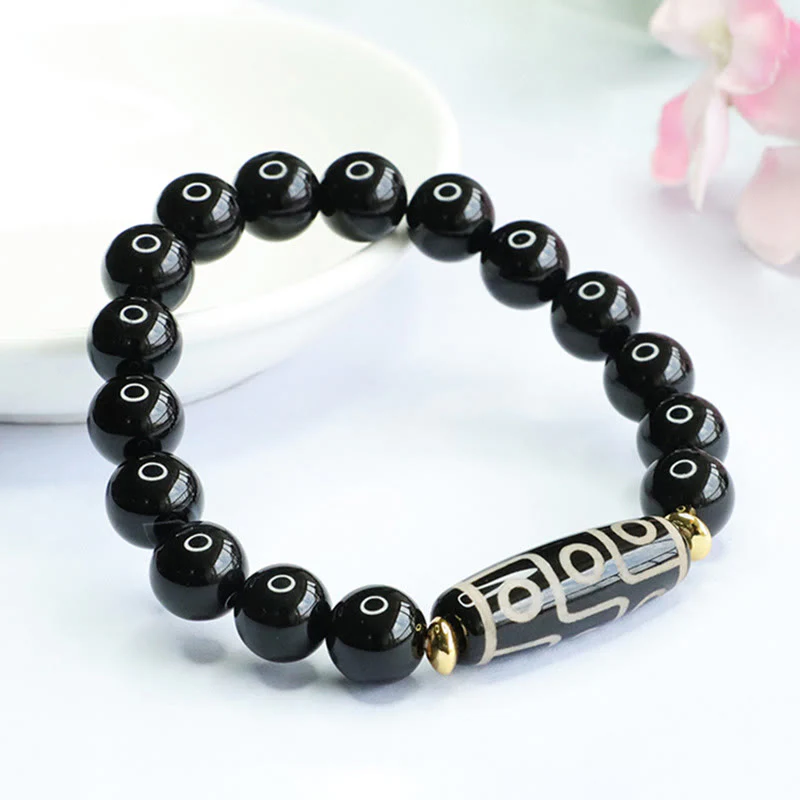 Braccialetto di potere in onice nero con perline Dzi tibetane a nove occhi Buddha Stones - Image 2