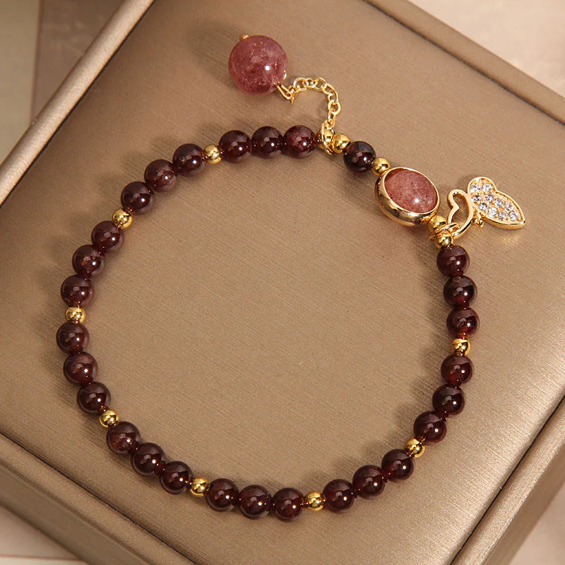 Braccialetto di protezione a farfalla in quarzo fragola e granato naturale Buddha Stones - Image 2