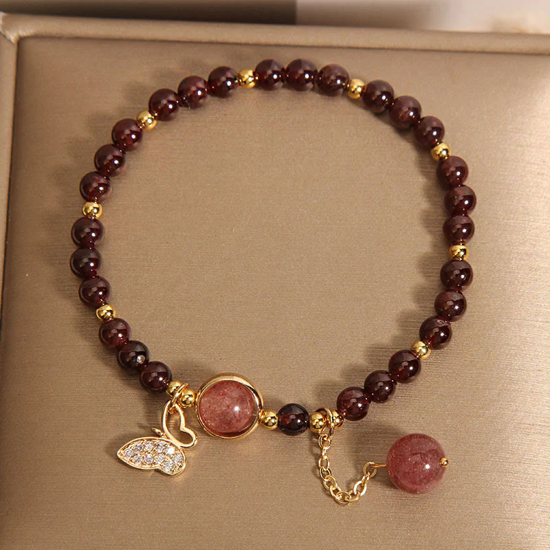 Braccialetto di protezione a farfalla in quarzo fragola e granato naturale Buddha Stones - Image 3