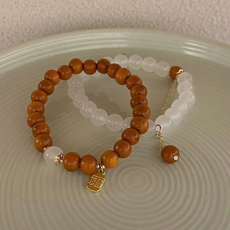 Braccialetto di protezione con ciondolo a forma di carattere Fu con occhio di gatto Buddha Stones in legno di sandalo - Image 17