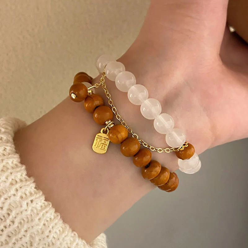 Braccialetto di protezione con ciondolo a forma di carattere Fu con occhio di gatto Buddha Stones in legno di sandalo - Image 19