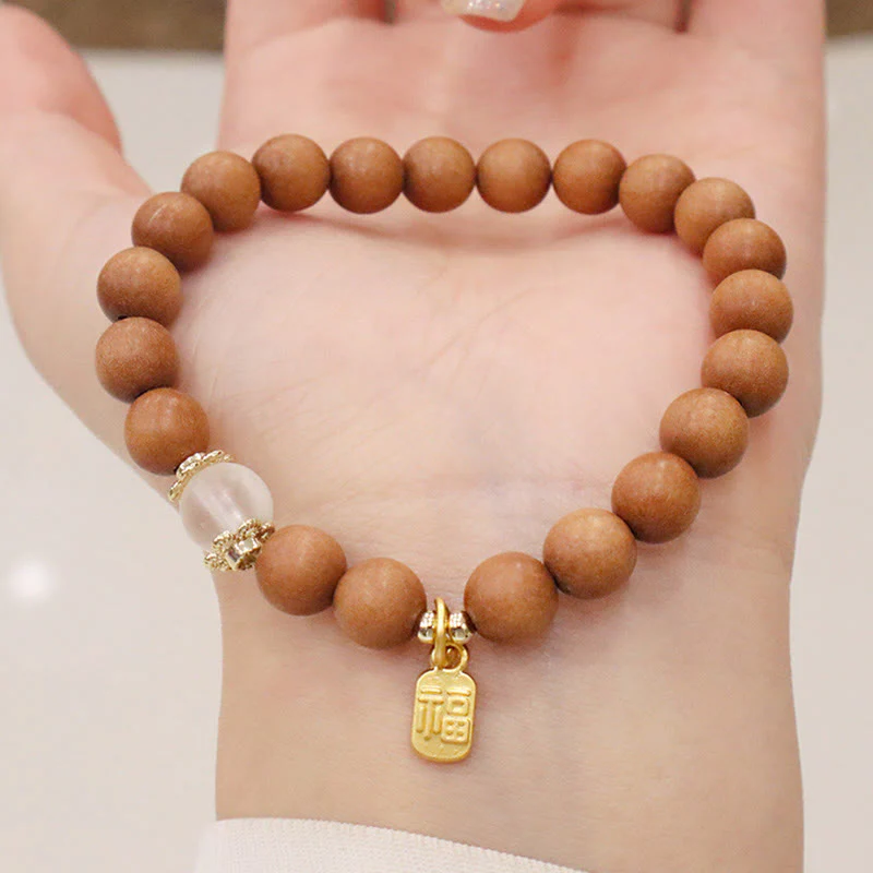 Braccialetto di protezione con ciondolo a forma di carattere Fu con occhio di gatto Buddha Stones in legno di sandalo - Image 4