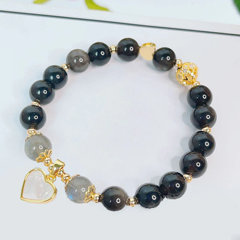 Braccialetto di protezione con cuore, stella e fiore in ossidiana naturale con Buddha Stones argento lucido - Image 3