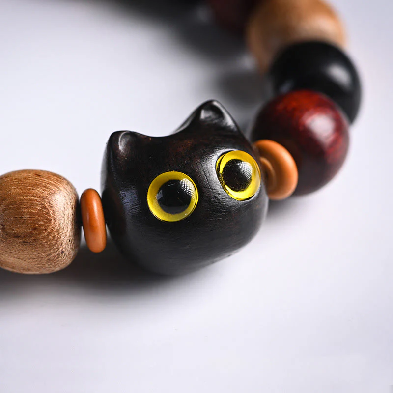 Braccialetto di protezione con incisione di gatto carino in legno di sandalo rosso e ebano con piccole foglie Buddha Stones - Image 8