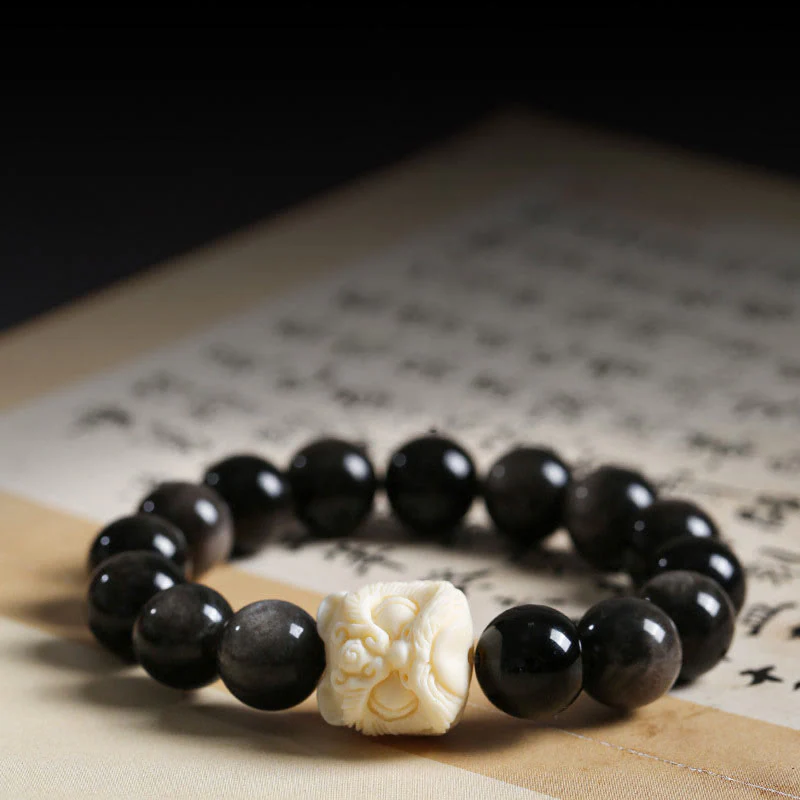 Braccialetto di protezione con leone danzante , Buddha Stones di avorio, seme di Bodhi, pietre di Buddha, argento lucido e ossidiana