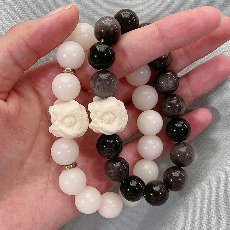 Braccialetto di protezione con leone danzante , Buddha Stones di avorio, seme di Bodhi, pietre di Buddha, argento lucido e ossidiana - Image 3