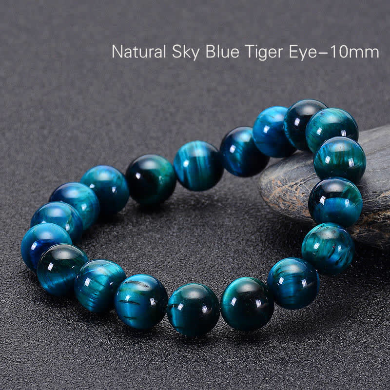 Braccialetto di protezione con occhio di tigre blu Buddha Stones - Image 5