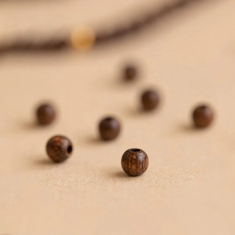 Braccialetto di protezione con perline di rame placcate in oro 14K e legno di sandalo ultrasottile da 4 mm Buddha Stones - Image 11