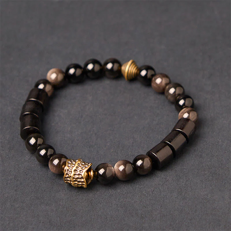 Braccialetto di protezione in ebano e ossidiana lucida color argento Buddha Stones