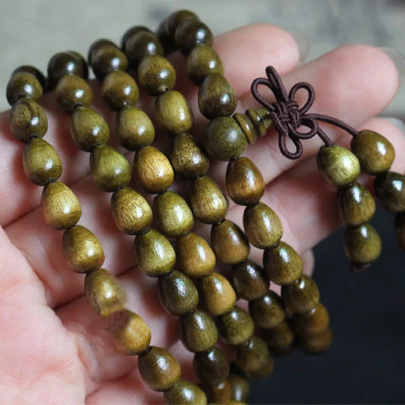 Braccialetto di protezione in legno naturale Phoebe Zhennan con 108 perle a goccia Mala Buddha Stones - Image 3