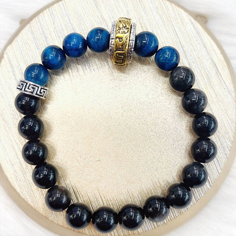 Braccialetto di protezione in occhio di tigre blu ossidiana e argento lucido Buddha Stones - Image 10