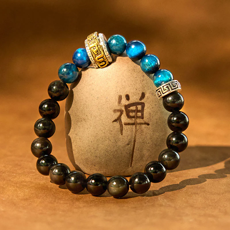 Braccialetto di protezione in occhio di tigre blu ossidiana e argento lucido Buddha Stones - Image 2