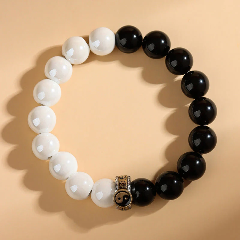 Braccialetto di realizzazione Yin Yang con perline di porcellana bianca e ossidiana nera Buddha Stones - Image 10