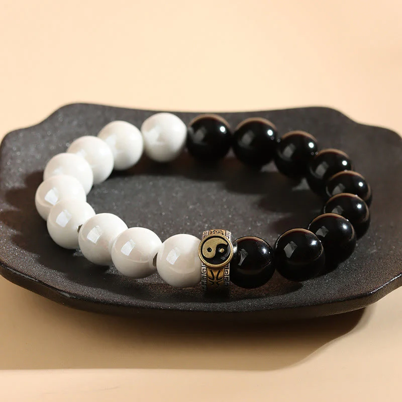 Braccialetto di realizzazione Yin Yang con perline di porcellana bianca e ossidiana nera Buddha Stones - Image 3