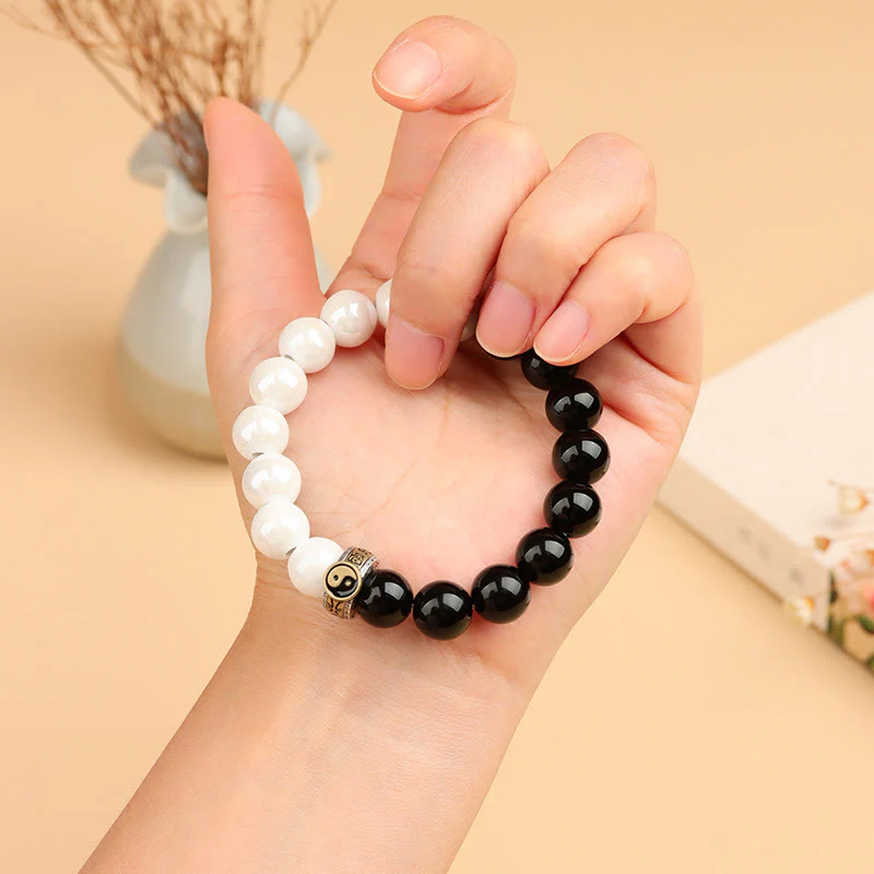 Braccialetto di realizzazione Yin Yang con perline di porcellana bianca e ossidiana nera Buddha Stones - Image 4