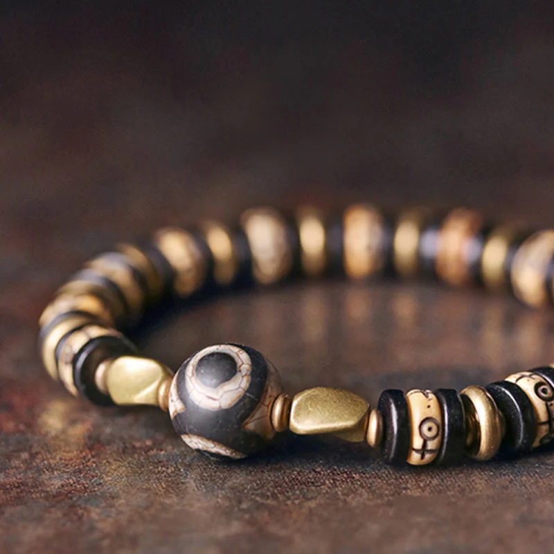 Braccialetto di forza in perline di osso tibetano e legno di ebano con Buddha Stones - Image 7