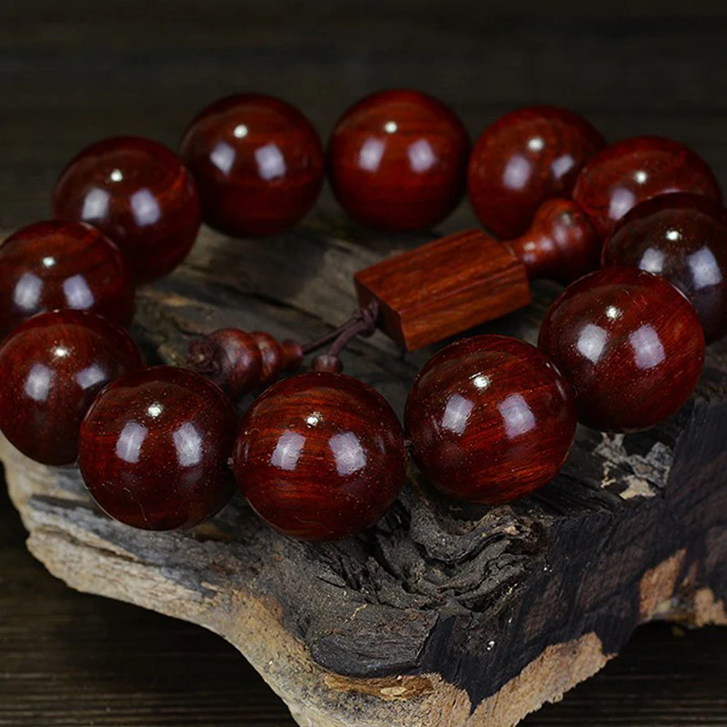 Braccialetto di rilassamento in legno di sandalo rosso con foglie piccole tibetane Buddha Stones - Image 3