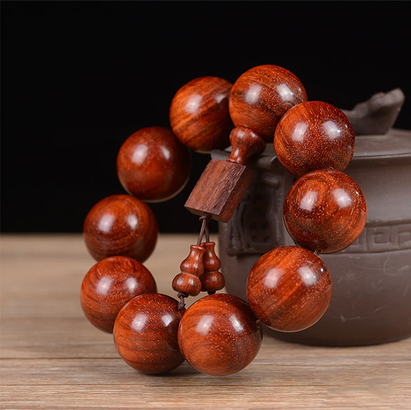 Braccialetto di rilassamento in legno di sandalo rosso con foglie piccole tibetane Buddha Stones - Image 5