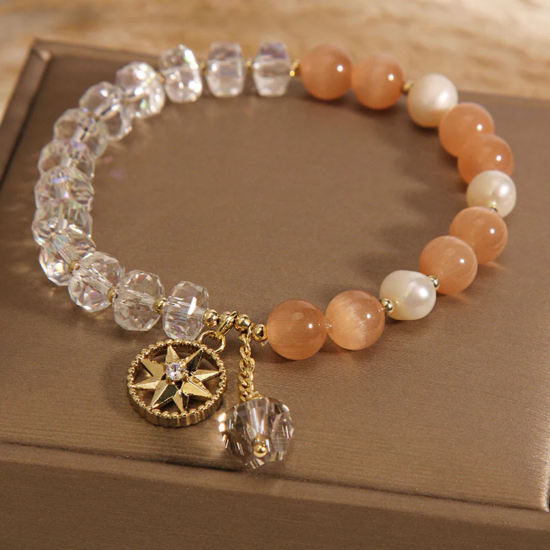 Braccialetto di supporto con stella di cristallo bianco e occhio di gatto arancione Buddha Stones - Image 2