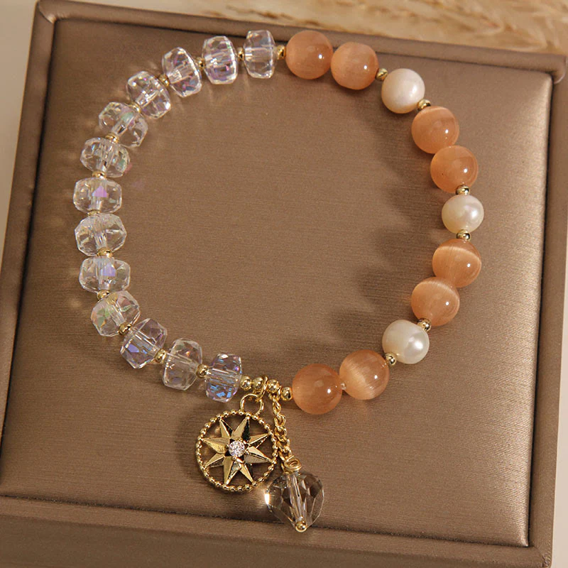 Braccialetto di supporto con stella di cristallo bianco e occhio di gatto arancione Buddha Stones - Image 3