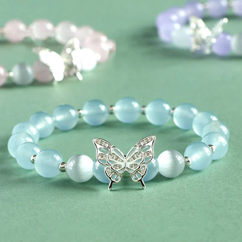 Braccialetto energetico a farfalla in calcedonio blu, cristallo rosa e calcedonio viola Buddha Stones