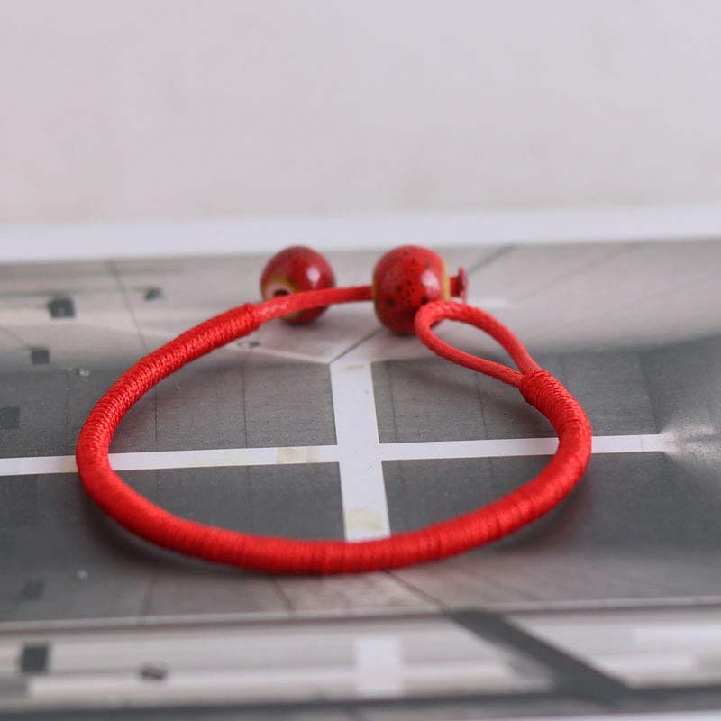 Braccialetto in ceramica con corda rossa portafortuna FengShui Buddha Stones - Image 8