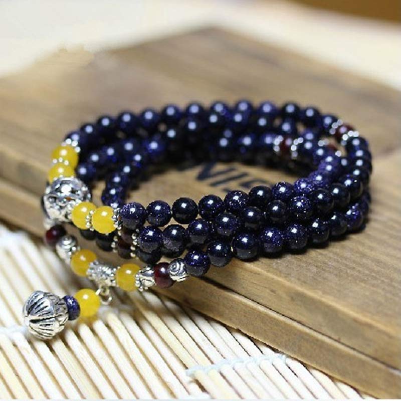 Braccialetto Mala con ciondolo di ricchezza in arenaria blu Buddha Stones - Image 4